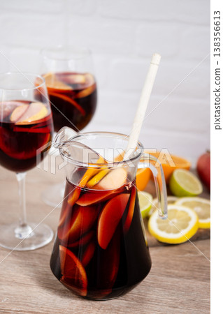 Sangria cocktail with fresh fruit 138356613