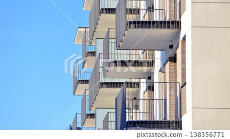 Apartments in residential complex. Housing structure at modern house.  Architecture for property investment. and architecture details. Urban abstract - windows of apartment building. 138356771