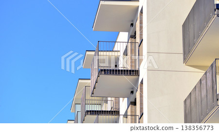 Apartments in residential complex. Housing structure at modern house.  Architecture for property investment. and architecture details. Urban abstract - windows of apartment building. 138356773