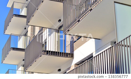 Apartments in residential complex. Housing structure at modern house.  Architecture for property investment. and architecture details. Urban abstract - windows of apartment building. 138356777