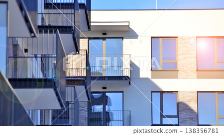 Apartments in residential complex. Housing structure at modern house.  Architecture for property investment. and architecture details. Urban abstract - windows of apartment building. 138356781