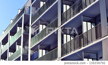 Apartments in residential complex. Housing structure at modern house.  Architecture for property investment. and architecture details. Urban abstract - windows of apartment building. 138356792