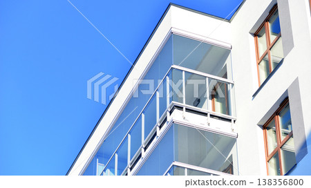 Apartments in residential complex. Housing structure at modern house.  Architecture for property investment. and architecture details. Urban abstract - windows of apartment building. 138356800