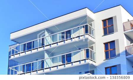 Apartments in residential complex. Housing structure at modern house. Architecture for property investment. and architecture details. Urban abstract - windows of apartment building. Apartments in residential complex. Housing structure at modern house. Architecture for property investment. and architecture details. Urban abstract - windows of apartment building. 138356809