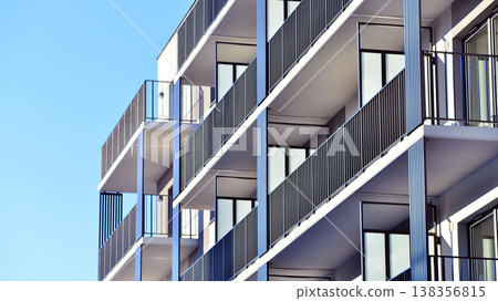 Apartments in residential complex. Housing structure at modern house.  Architecture for property investment. and architecture details. Urban abstract - windows of apartment building. 138356815
