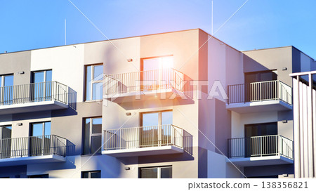 Apartments in residential complex. Housing structure at modern house. Architecture for property investment. and architecture details. Urban abstract - windows of apartment building. Apartments in residential complex. Housing structure at modern house. Architecture for property investment. and architecture details. Urban abstract - windows of apartment building. 138356821