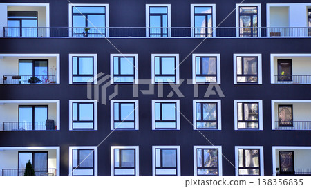 Apartments in residential complex. Housing structure at modern house. Architecture for property investment. and architecture details. Urban abstract - windows of apartment building. Apartments in residential complex. Housing structure at modern house. Architecture for property investment. and architecture details. Urban abstract - windows of apartment building. 138356835