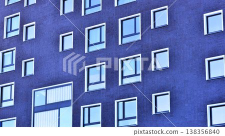 Apartments in residential complex. Housing structure at modern house.  Architecture for property investment. and architecture details. Urban abstract - windows of apartment building. 138356840