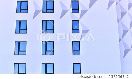 Apartments in residential complex. Housing structure at modern house.  Architecture for property investment. and architecture details. Urban abstract - windows of apartment building. 138356842