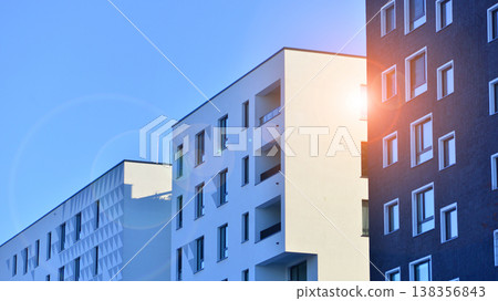 Apartments in residential complex. Housing structure at modern house. Architecture for property investment. and architecture details. Urban abstract - windows of apartment building. Apartments in residential complex. Housing structure at modern house. Architecture for property investment. and architecture details. Urban abstract - windows of apartment building. 138356843
