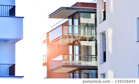 Apartments in residential complex. Housing structure at modern house.  Architecture for property investment. and architecture details. Urban abstract - windows of apartment building. 138356845