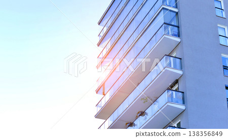 Apartments in residential complex. Housing structure at modern house. Architecture for property investment. and architecture details. Urban abstract - windows of apartment building. Apartments in residential complex. Housing structure at modern house. Architecture for property investment. and architecture details. Urban abstract - windows of apartment building. 138356849