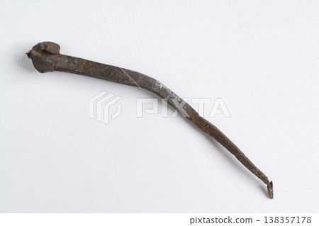 ancient hand-forged iron nails isolated ancient hand-forged iron nails isolated 138357178