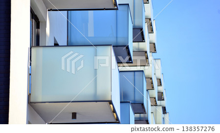 Apartments in residential complex. Housing structure at modern house.  Architecture for property investment. and architecture details. Urban abstract - windows of apartment building. 138357276