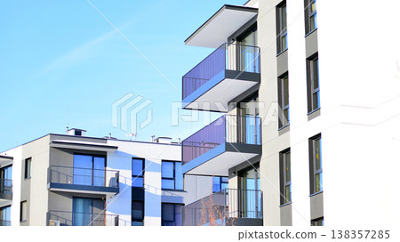 Apartments in residential complex. Housing structure at modern house.  Architecture for property investment. and architecture details. Urban abstract - windows of apartment building. 138357285