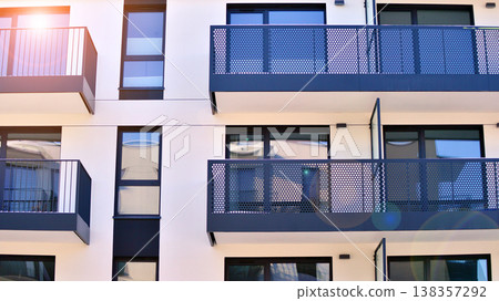 Apartments in residential complex. Housing structure at modern house. Architecture for property investment. and architecture details. Urban abstract - windows of apartment building. Apartments in residential complex. Housing structure at modern house. Architecture for property investment. and architecture details. Urban abstract - windows of apartment building. 138357292