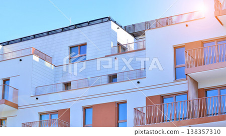 Apartments in residential complex. Housing structure at modern house. Architecture for property investment. and architecture details. Urban abstract - windows of apartment building. Apartments in residential complex. Housing structure at modern house. Architecture for property investment. and architecture details. Urban abstract - windows of apartment building. 138357310