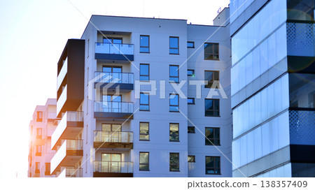 Apartments in residential complex. Housing structure at modern house. Architecture for property investment. and architecture details. Urban abstract - windows of apartment building. Apartments in residential complex. Housing structure at modern house. Architecture for property investment. and architecture details. Urban abstract - windows of apartment building. 138357409