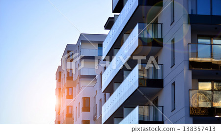 Apartments in residential complex. Housing structure at modern house.  Architecture for property investment. and architecture details. Urban abstract - windows of apartment building. 138357413