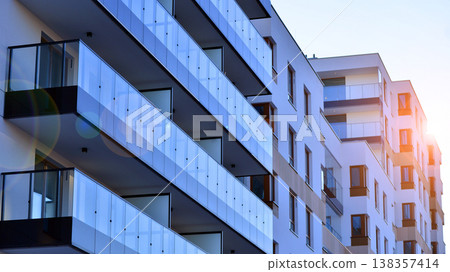 Apartments in residential complex. Housing structure at modern house.  Architecture for property investment. and architecture details. Urban abstract - windows of apartment building. 138357414