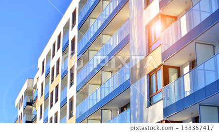 Apartments in residential complex. Housing structure at modern house. Architecture for property investment. and architecture details. Urban abstract - windows of apartment building. Apartments in residential complex. Housing structure at modern house. Architecture for property investment. and architecture details. Urban abstract - windows of apartment building. 138357417