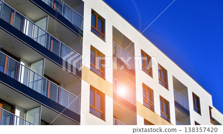 Apartments in residential complex. Housing structure at modern house.  Architecture for property investment. and architecture details. Urban abstract - windows of apartment building. 138357420