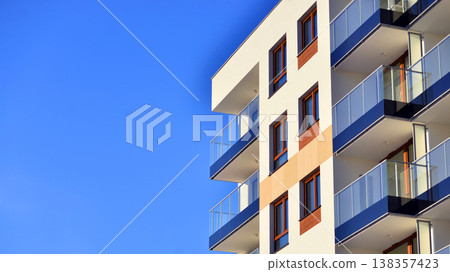 Apartments in residential complex. Housing structure at modern house. Architecture for property investment. and architecture details. Urban abstract - windows of apartment building. Apartments in residential complex. Housing structure at modern house. Architecture for property investment. and architecture details. Urban abstract - windows of apartment building. 138357423