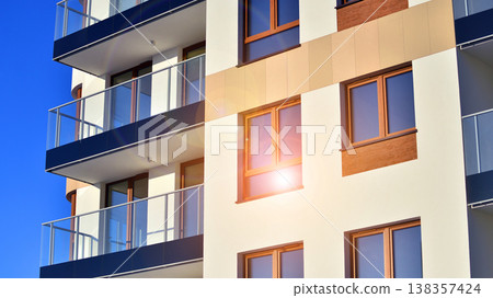 Apartments in residential complex. Housing structure at modern house. Architecture for property investment. and architecture details. Urban abstract - windows of apartment building. Apartments in residential complex. Housing structure at modern house. Architecture for property investment. and architecture details. Urban abstract - windows of apartment building. 138357424