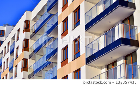 Apartments in residential complex. Housing structure at modern house.  Architecture for property investment. and architecture details. Urban abstract - windows of apartment building. 138357433