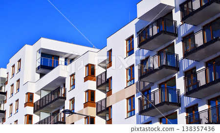 Apartments in residential complex. Housing structure at modern house.  Architecture for property investment. and architecture details. Urban abstract - windows of apartment building. 138357436