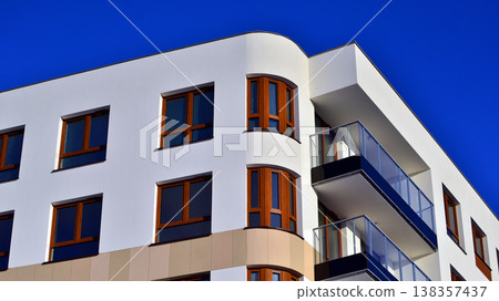Apartments in residential complex. Housing structure at modern house. Architecture for property investment. and architecture details. Urban abstract - windows of apartment building. Apartments in residential complex. Housing structure at modern house. Architecture for property investment. and architecture details. Urban abstract - windows of apartment building. 138357437