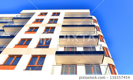 Apartments in residential complex. Housing structure at modern house. Architecture for property investment. and architecture details. Urban abstract - windows of apartment building. Apartments in residential complex. Housing structure at modern house. Architecture for property investment. and architecture details. Urban abstract - windows of apartment building. 138357454