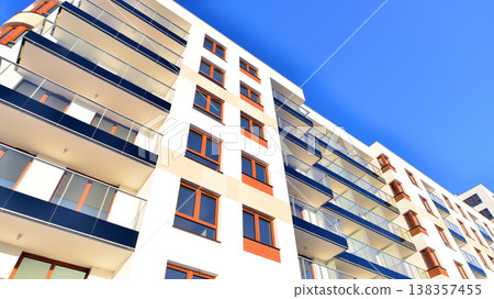 Apartments in residential complex. Housing structure at modern house. Architecture for property investment. and architecture details. Urban abstract - windows of apartment building. Apartments in residential complex. Housing structure at modern house. Architecture for property investment. and architecture details. Urban abstract - windows of apartment building. 138357455