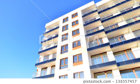 Apartments in residential complex. Housing structure at modern house. Architecture for property investment. and architecture details. Urban abstract - windows of apartment building. Apartments in residential complex. Housing structure at modern house. Architecture for property investment. and architecture details. Urban abstract - windows of apartment building. 138357457