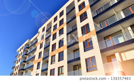 Apartments in residential complex. Housing structure at modern house. Architecture for property investment. and architecture details. Urban abstract - windows of apartment building. Apartments in residential complex. Housing structure at modern house. Architecture for property investment. and architecture details. Urban abstract - windows of apartment building. 138357463