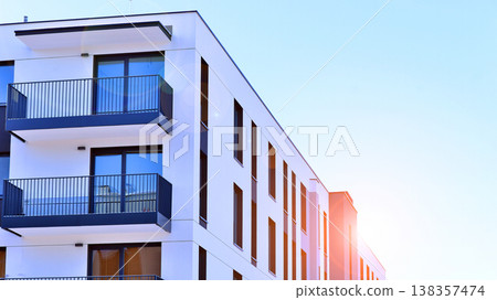 Apartments in residential complex. Housing structure at modern house. Architecture for property investment. and architecture details. Urban abstract - windows of apartment building. Apartments in residential complex. Housing structure at modern house. Architecture for property investment. and architecture details. Urban abstract - windows of apartment building. 138357474