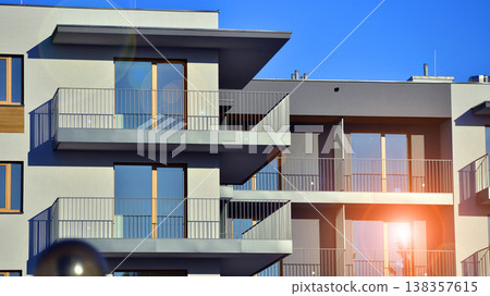 Apartments in residential complex. Housing structure at modern house.  Architecture for property investment. and architecture details. Urban abstract - windows of apartment building. 138357615