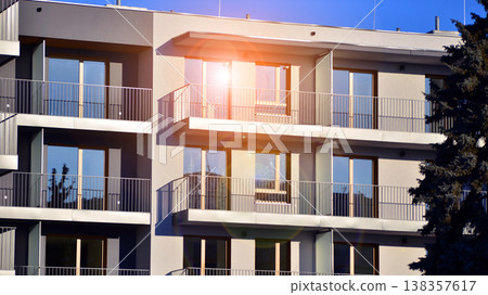 Apartments in residential complex. Housing structure at modern house. Architecture for property investment. and architecture details. Urban abstract - windows of apartment building. Apartments in residential complex. Housing structure at modern house. Architecture for property investment. and architecture details. Urban abstract - windows of apartment building. 138357617