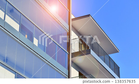 Apartments in residential complex. Housing structure at modern house. Architecture for property investment. and architecture details. Urban abstract - windows of apartment building. Apartments in residential complex. Housing structure at modern house. Architecture for property investment. and architecture details. Urban abstract - windows of apartment building. 138357635
