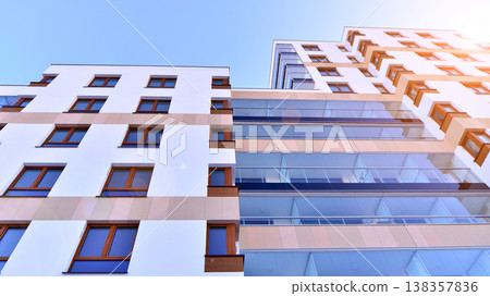 Apartments in residential complex. Housing structure at modern house.  Architecture for property investment. and architecture details. Urban abstract - windows of apartment building. 138357836