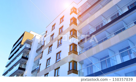 Apartments in residential complex. Housing structure at modern house. Architecture for property investment. and architecture details. Urban abstract - windows of apartment building. Apartments in residential complex. Housing structure at modern house. Architecture for property investment. and architecture details. Urban abstract - windows of apartment building. 138357839