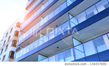 Apartments in residential complex. Housing structure at modern house.  Architecture for property investment. and architecture details. Urban abstract - windows of apartment building. 138357840