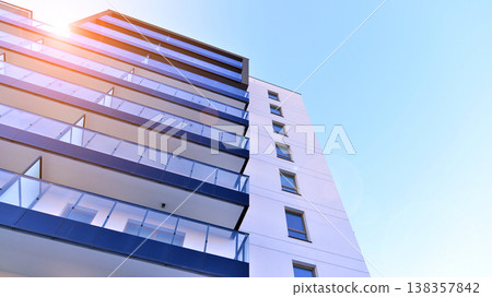Apartments in residential complex. Housing structure at modern house.  Architecture for property investment. and architecture details. Urban abstract - windows of apartment building. 138357842