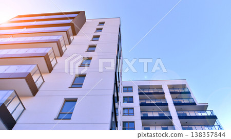 Apartments in residential complex. Housing structure at modern house. Architecture for property investment. and architecture details. Urban abstract - windows of apartment building. Apartments in residential complex. Housing structure at modern house. Architecture for property investment. and architecture details. Urban abstract - windows of apartment building. 138357844