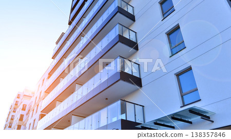 Apartments in residential complex. Housing structure at modern house. Architecture for property investment. and architecture details. Urban abstract - windows of apartment building. Apartments in residential complex. Housing structure at modern house. Architecture for property investment. and architecture details. Urban abstract - windows of apartment building. 138357846