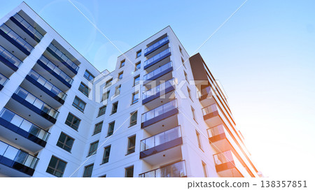 Apartments in residential complex. Housing structure at modern house. Architecture for property investment. and architecture details. Urban abstract - windows of apartment building. Apartments in residential complex. Housing structure at modern house. Architecture for property investment. and architecture details. Urban abstract - windows of apartment building. 138357851