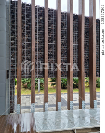 It is an outdoor park with wooden pillars. It is an outdoor park with wooden pillars. 138357862