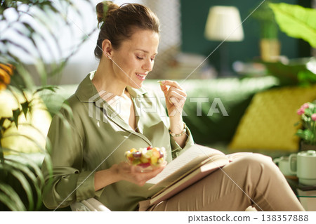 Peaceful Afternoon Reading and Snacking at Home 138357888