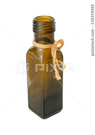 Glass decorative bottle for flowers isolated on white background. Home decor. Colored glass for living room decor. Table setting and floral styling. Glass decorative bottle for flowers isolated on white background. Home decor. Colored glass for living room decor. Table setting and floral styling. 138359489
