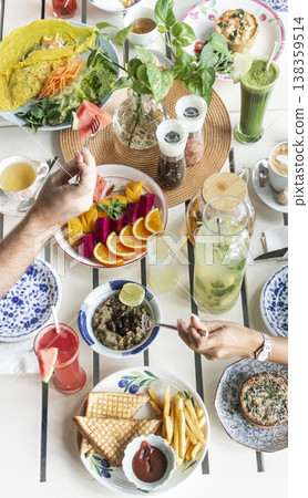 mixed western healthy food meal on restaurant table outdoors in singapore restaurant mixed western healthy food meal on restaurant table outdoors in singapore restaurant 138359514